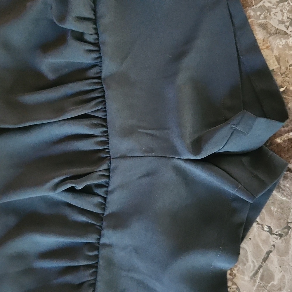 Cute black mini skirt by Impeccable Pig. Zips up the side, great condition! - Picture 5 of 9